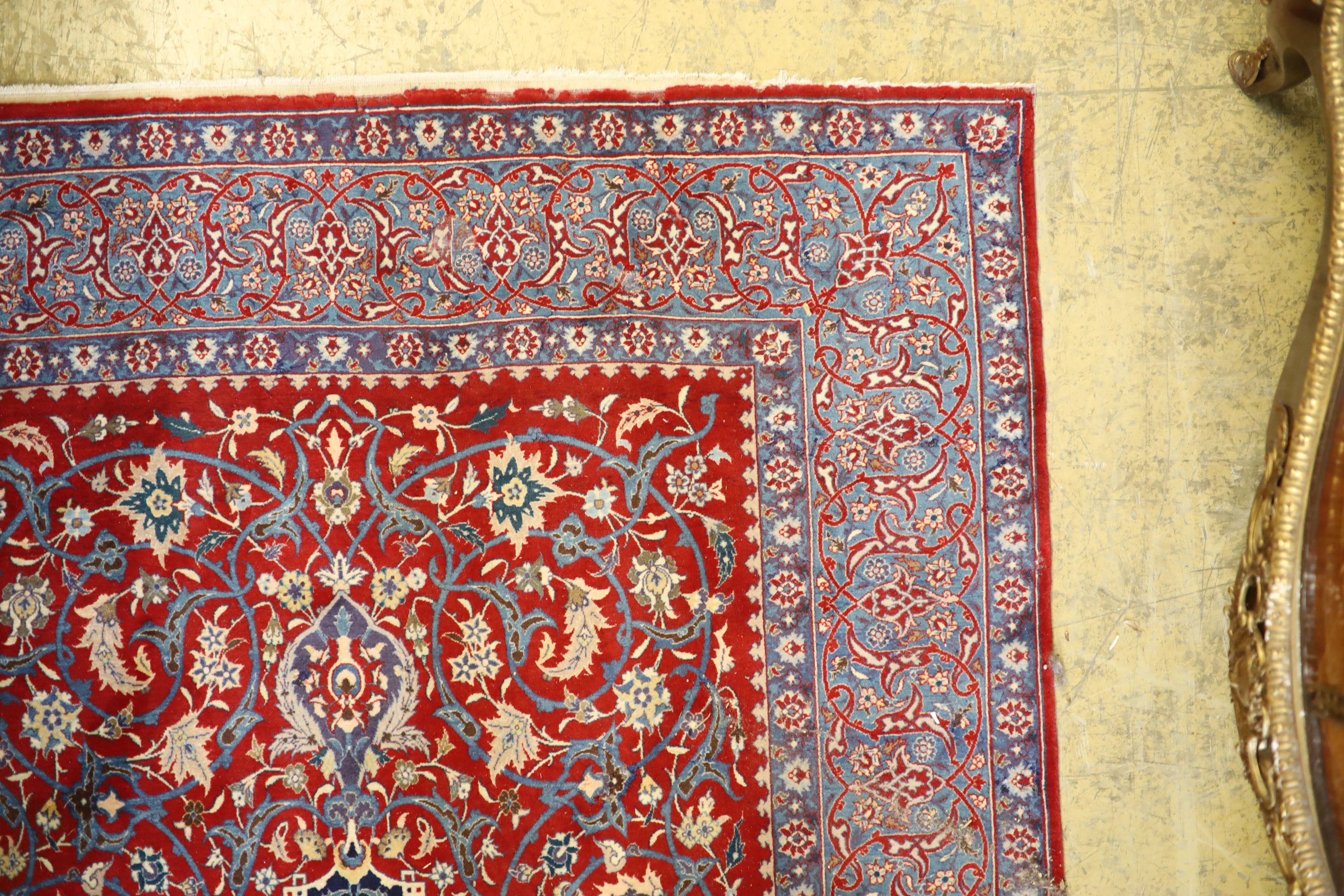 An Isfahan red ground rug, 169 x 110cm